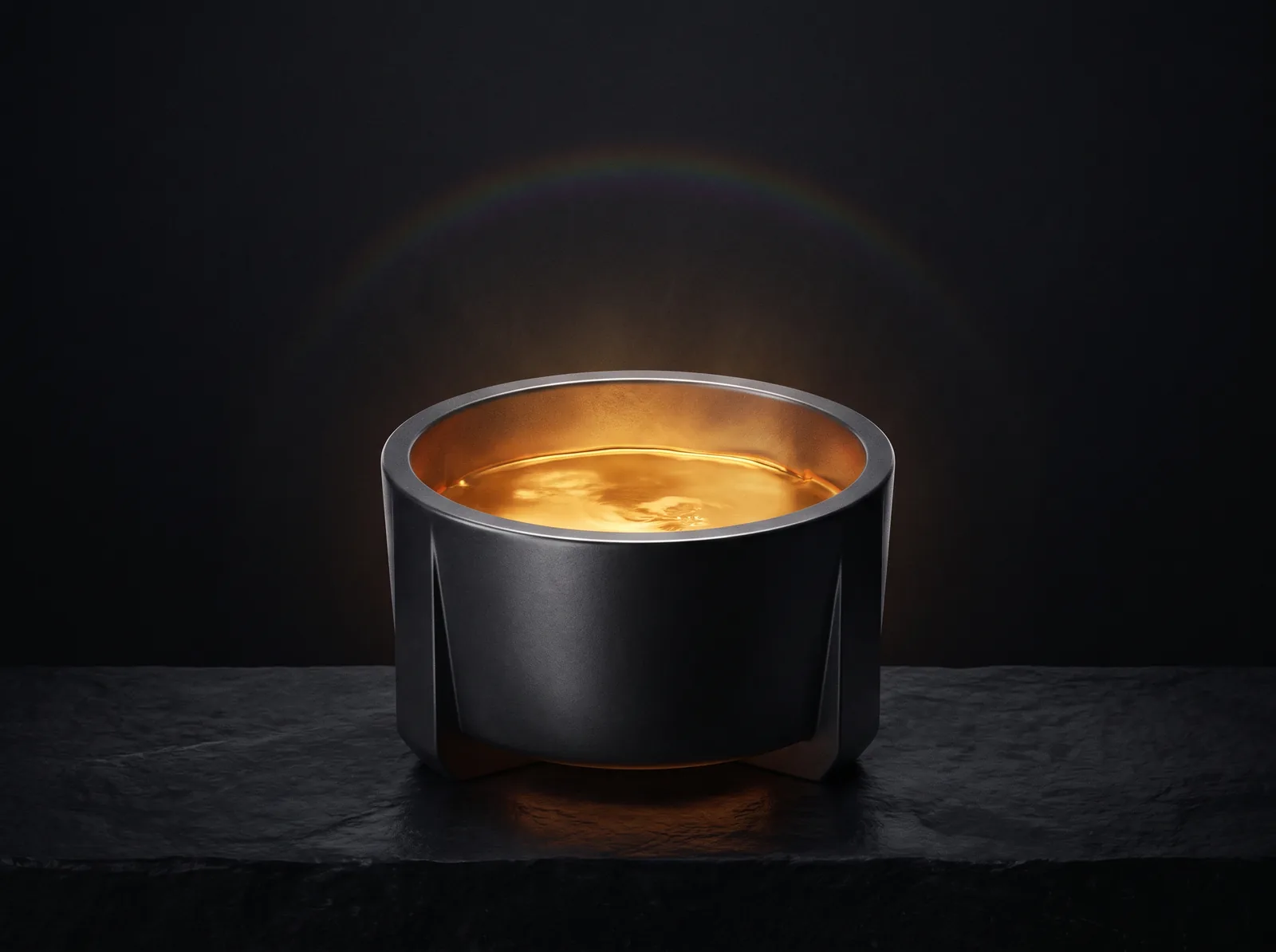 Molten gold in a dark vessel